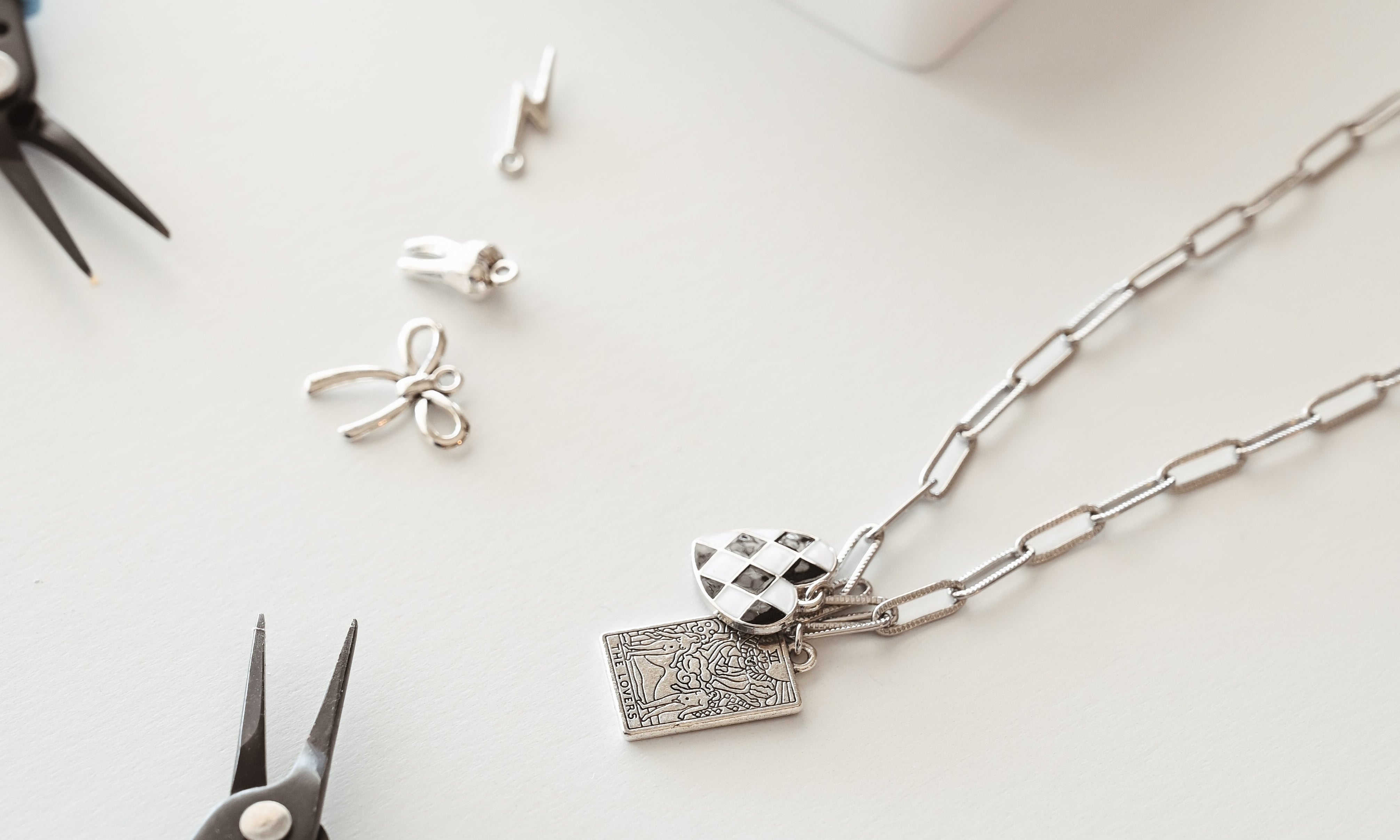 Charm Bar vs Permanent Jewelry