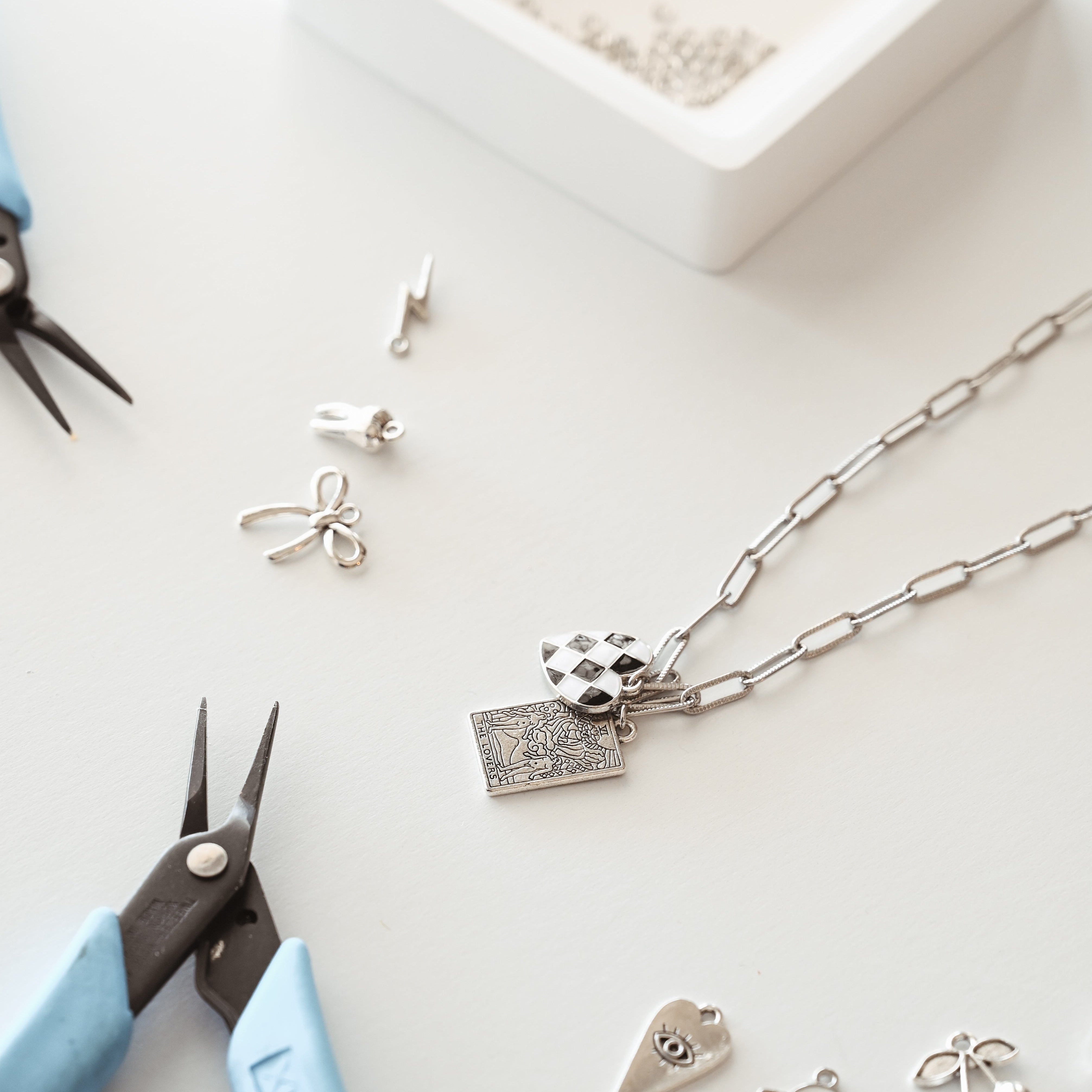 Charm Bar vs Permanent Jewelry